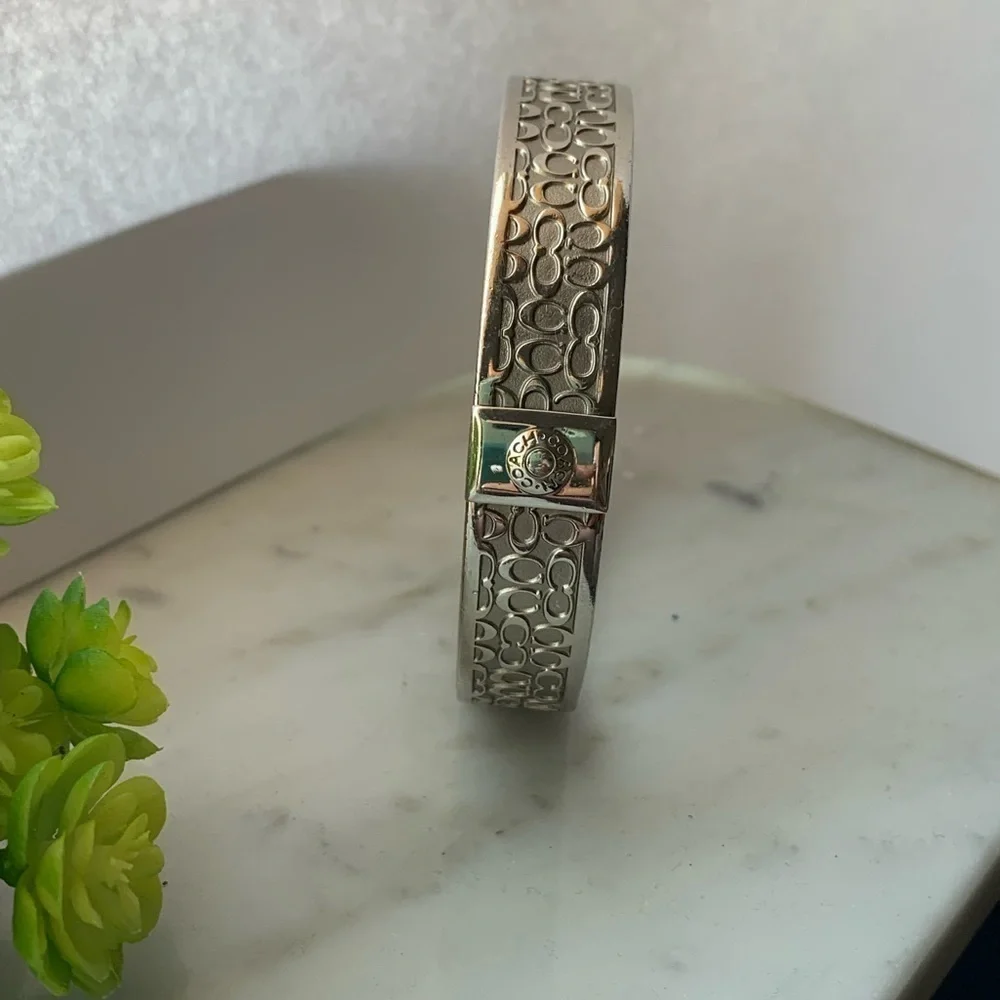 Coach Signature silver bracelet for women. Authentic